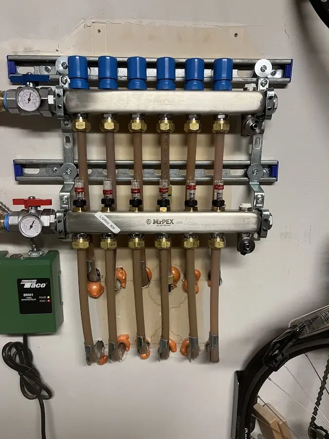 Plumber performing Water Heater Repair at a residential property in Fairhaven